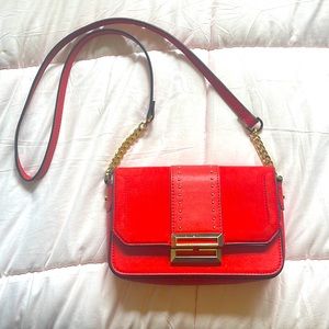 Red leather and velvet purse.